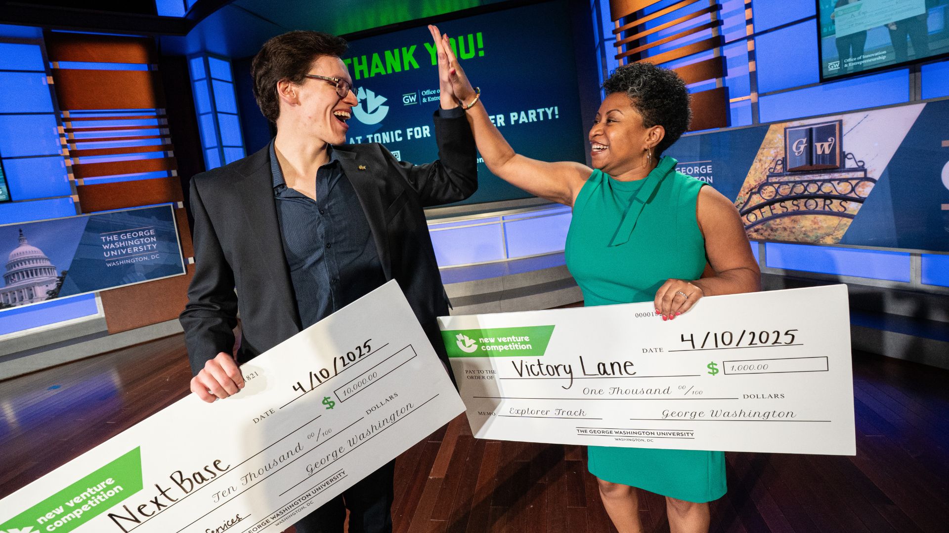 NVC 2025 winners holding checks